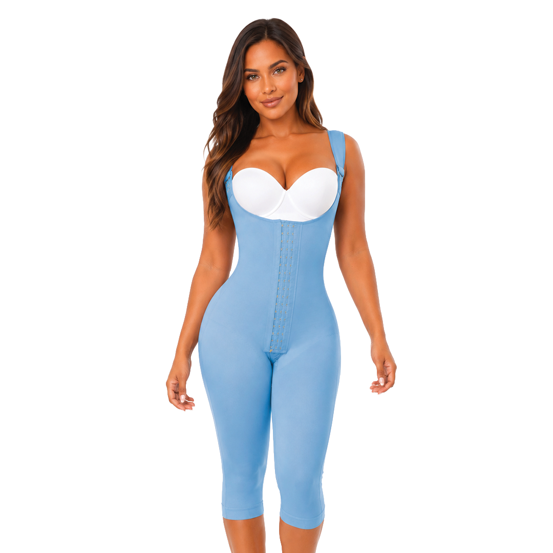 A woman modeling a light blue full-body post-surgical faja stage 1  with a white bra underneath, set against a plain white background.